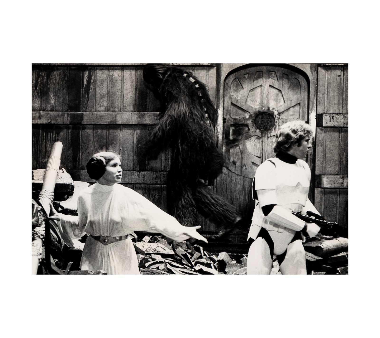 1977  Carrie Fisher, Harrison Ford, and Peter Mayhew in Star Wars- Episode IV - A New Hope 