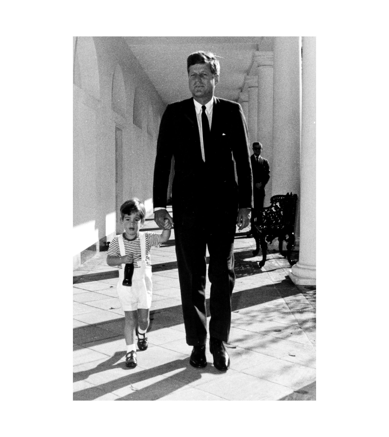 1963 John F. Kennedy with JFK Jr. at the West Wing Colonnade of the White House 